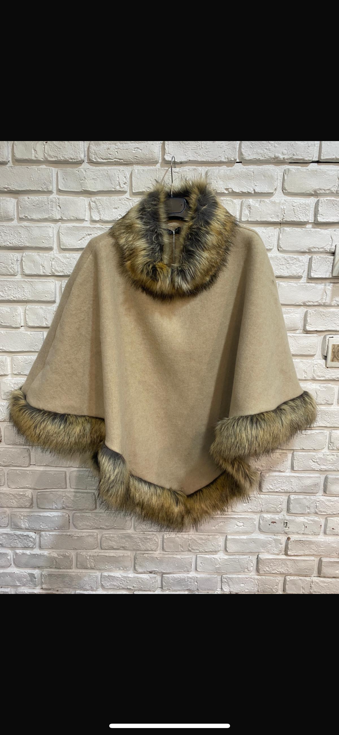 Bennet Poncho **ships to us 10.21