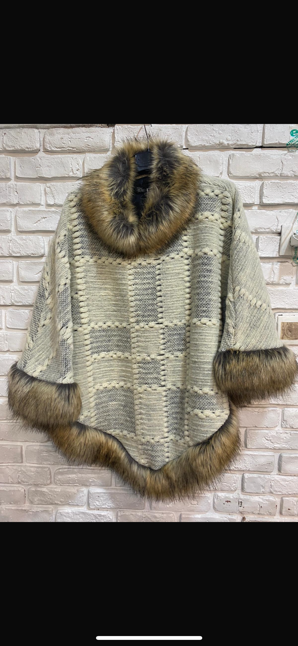 Bradford Poncho **ships to us 10.21