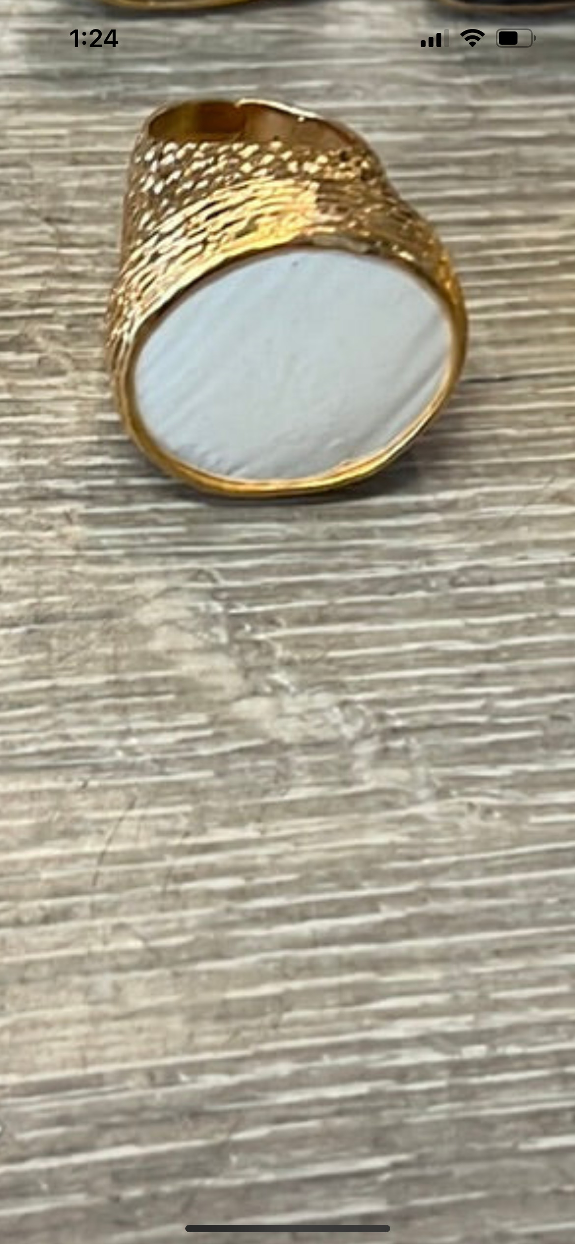 Cocktail pounded gold ring