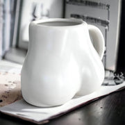Glossy white butt mug