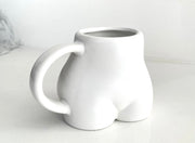 Glossy white butt mug